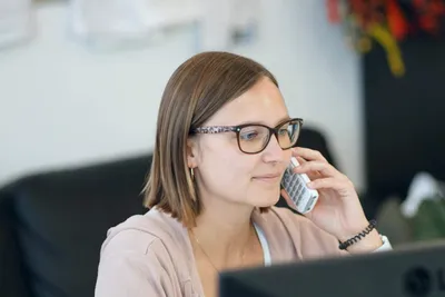 Practice team member giving support by phone