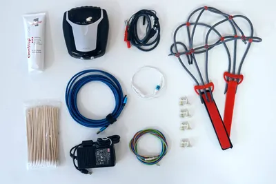Contents of the home training set: EEG device, electrodes, cables and gel